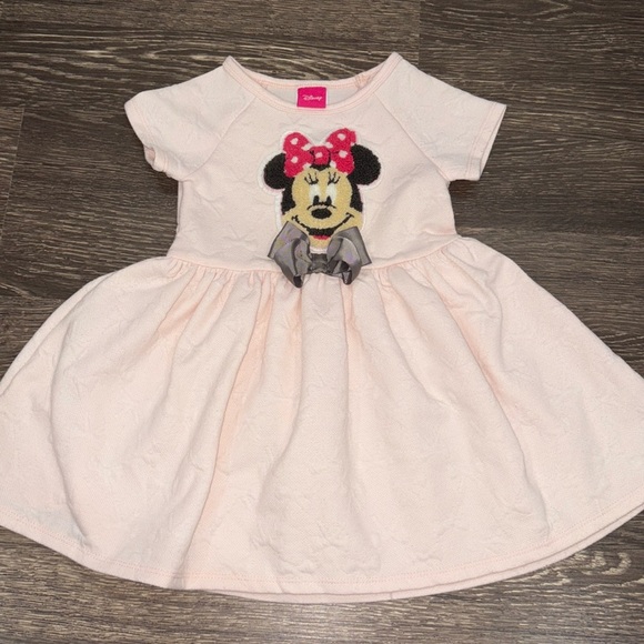 Disney Other - Disney light pink mini dress with a mini patch and bow detail throughout